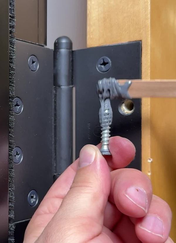 Fixing a stripped hinge screw with J-B Weld epoxy